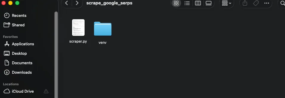 Project folder with scraper.py and a virtual environment